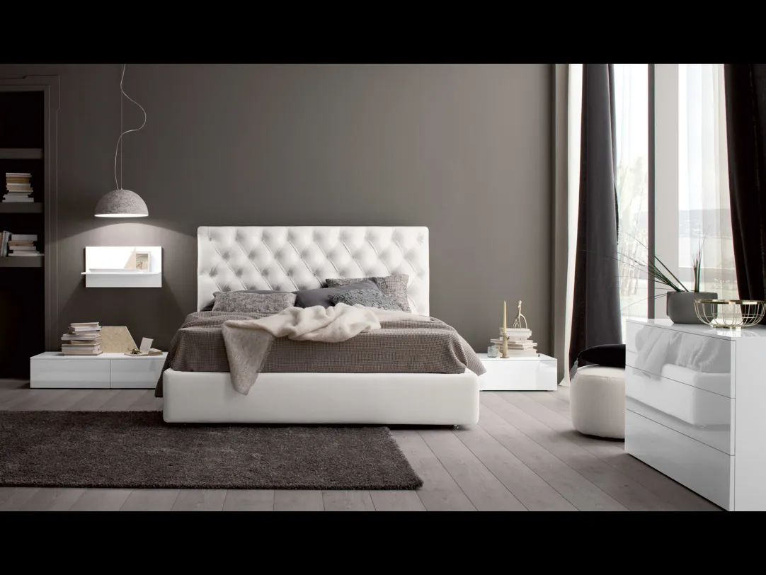 Letto in pelle con testiera lavorazione capitonné Royal di Spagnol Mobili