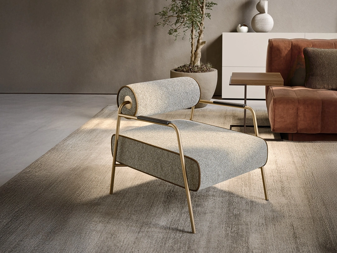Poltroncina Levante in tessuto imbottito di Pianca